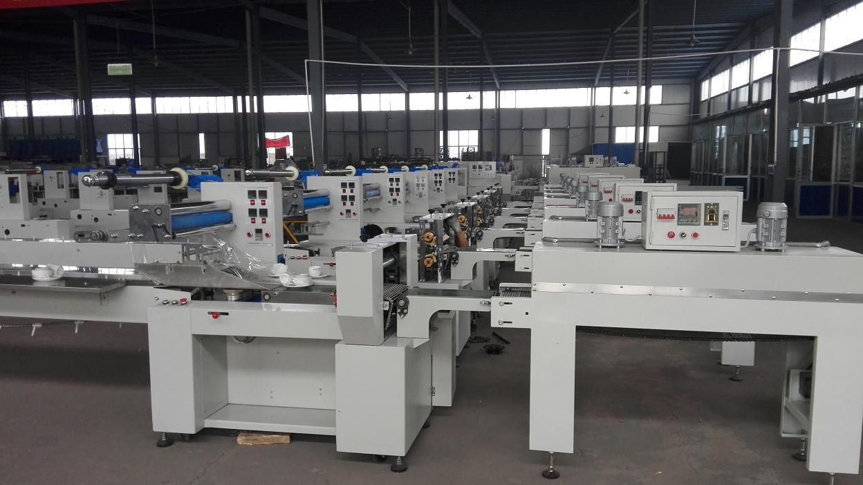 1584147800560355.jpg 水晶餐具包装机.jpg